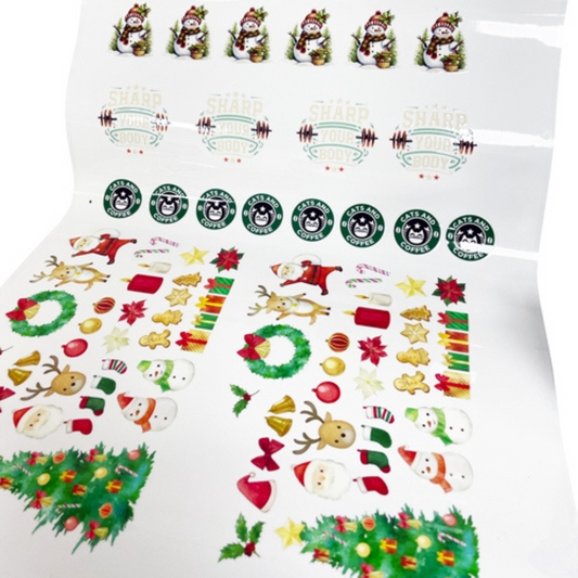 UV DTF prints of Christmas-themed stickers with Starbucks logo on a white background